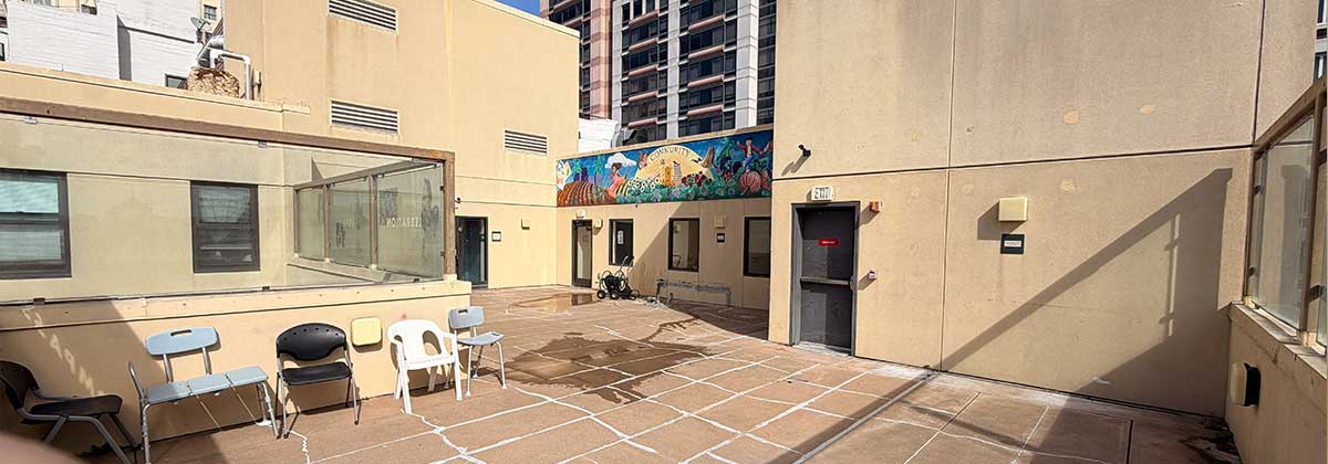 Amores Daycare rooftop outdoor play area with San Francisco city views